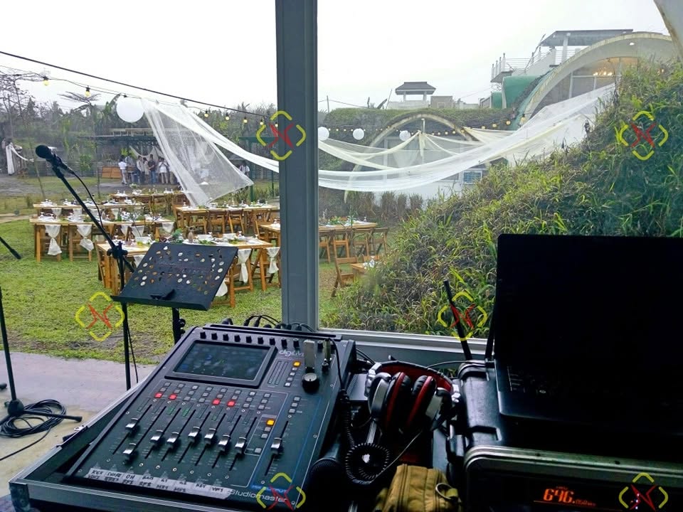 Soundph digital mixing console and microphones set for an outdoor wedding reception